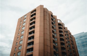 Would you prefer a flat in a bustling ci...